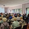 Eröffnungsveranstaltung mit einem vollem Veranstaltungsraum